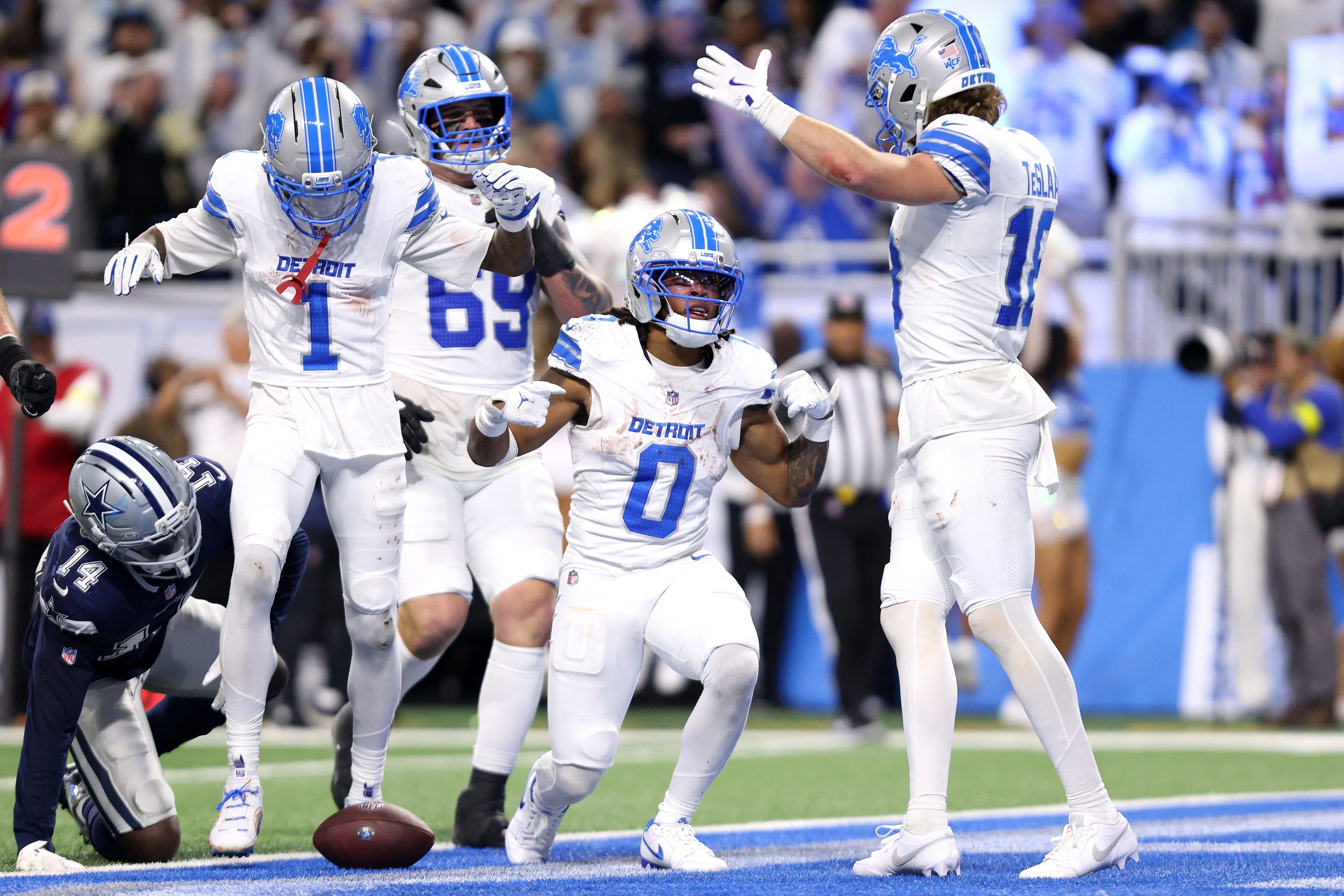 DETROIT, MICHIGAN - DECEMBER 04: Jahmyr Gibbs #0 of the Detroit Lions celebrates a touchdown against the Detroit Lions during the fourth quarter at Ford Field on December 04, 2025 in Detroit, Michigan. (Photo by Mike Mulholland/Getty Images)