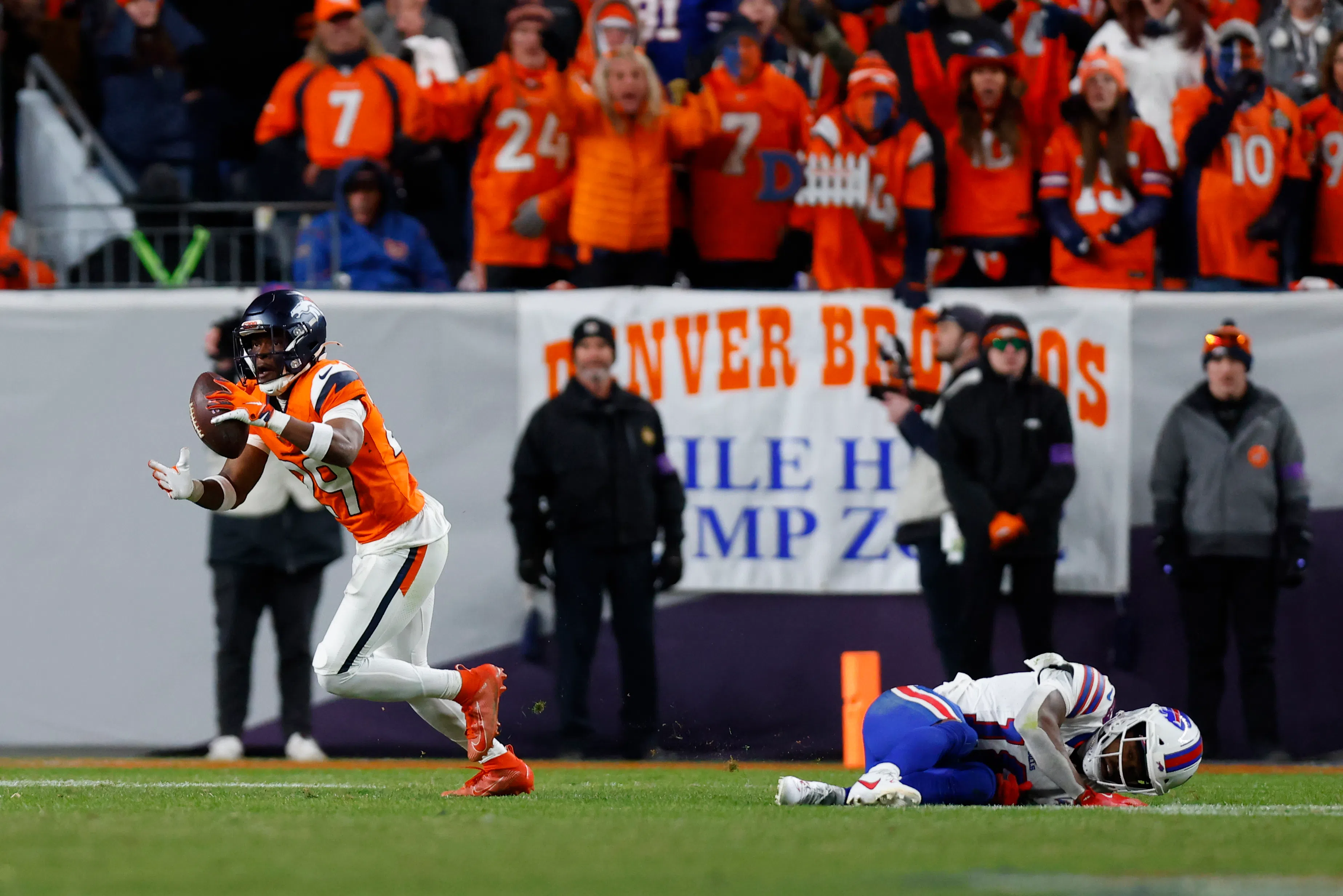 DENVER, COLORADO - JANUARY 17: Ja'quan McMillian #29 of the Denver Broncos celebrates after intercepting a pass intended for Brandin Cooks #18 of the Buffalo Bills during overtime in the AFC Divisional Playoff game at Empower Field At Mile High on January 17, 2026 in Denver, Colorado. (Photo by Justin Edmonds/Getty Images)