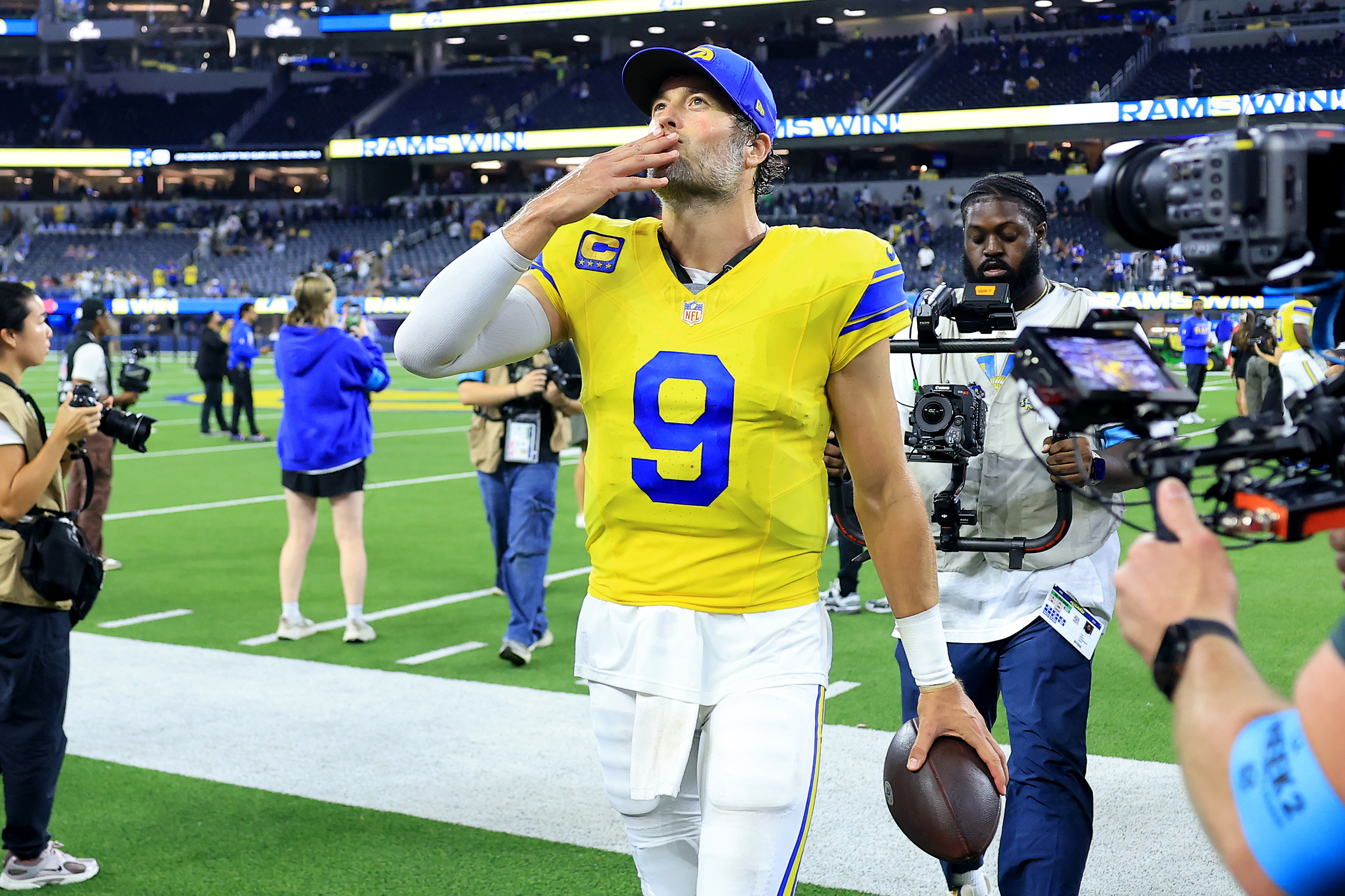 INGLEWOOD, CALIFORNIA - SEPTEMBER 21: Matthew Stafford #9 of the Los Angeles Rams blows a kiss after defeating the New York Giants in the game at SoFi Stadium on September 21, 2026 in Inglewood, California. (Photo by Sean M. Haffey/Getty Images)