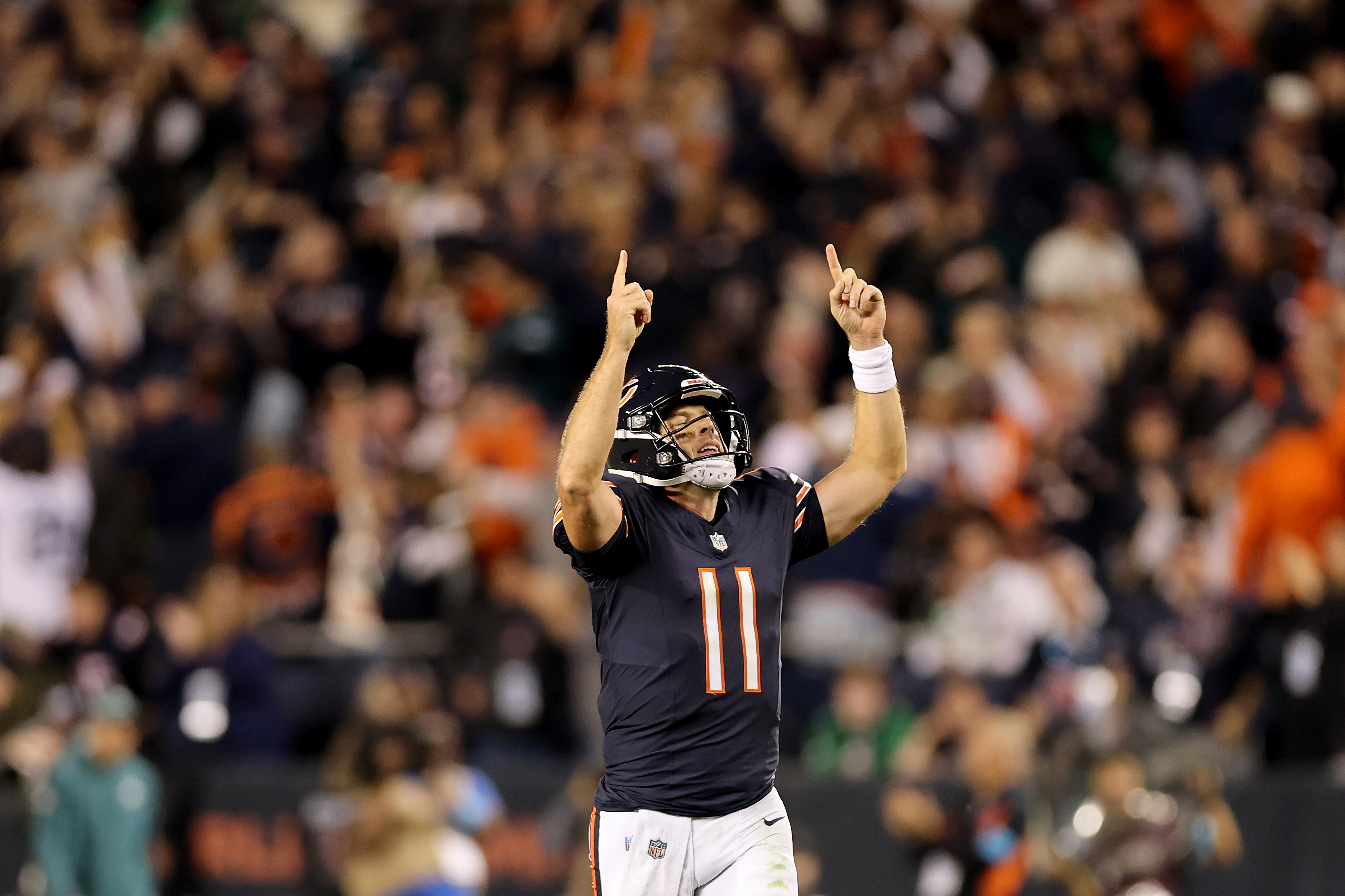 CHICAGO, ILLINOIS - SEPTEMBER 28: Case Keenum #11 of the Chicago Bears celebrates after Kalif Raymond #14 scored a 41 yard touchdown against the Philadelphia Eagles during the fourth quarter of the game at Soldier Field on September 28, 2026 in Chicago, Illinois. (Photo by Michael Reaves/Getty Images)