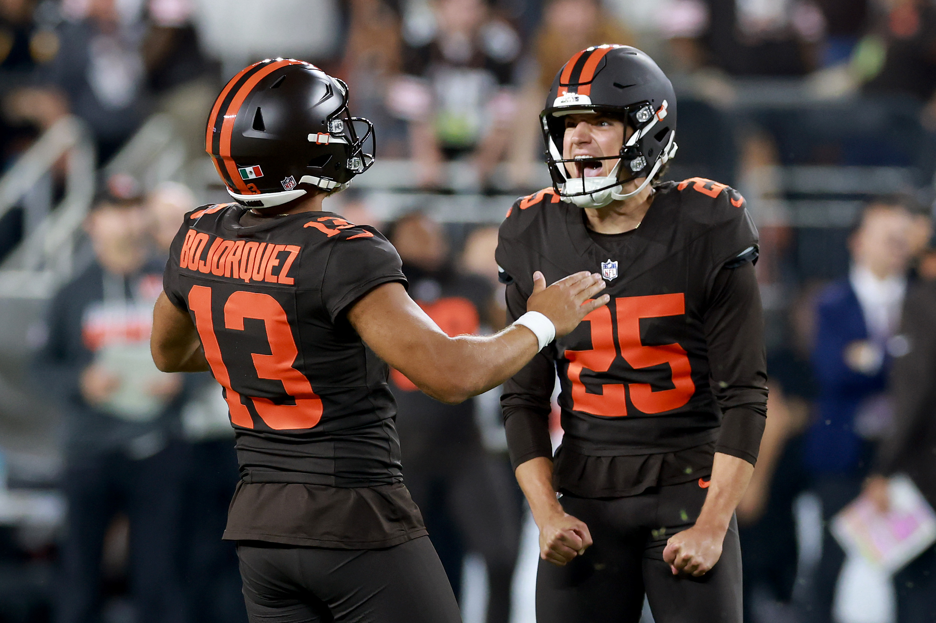 CLEVELAND, OHIO - OCTOBER 01: Andre Szmyt #25 of the Cleveland Browns celebrates with Corey Bojorquez #13 after kicking a 56 yard game winning field goal against the Pittsburgh Steelers during the fourth quarter of the game at Huntington Bank Field on October 01, 2026 in Cleveland, Ohio. (Photo by Gregory Shamus/Getty Images)