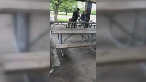 PHOTO: The first officer on the scene did not appear to intervene and has since been placed on desk duty. (Mia Irizarry/Facebook)