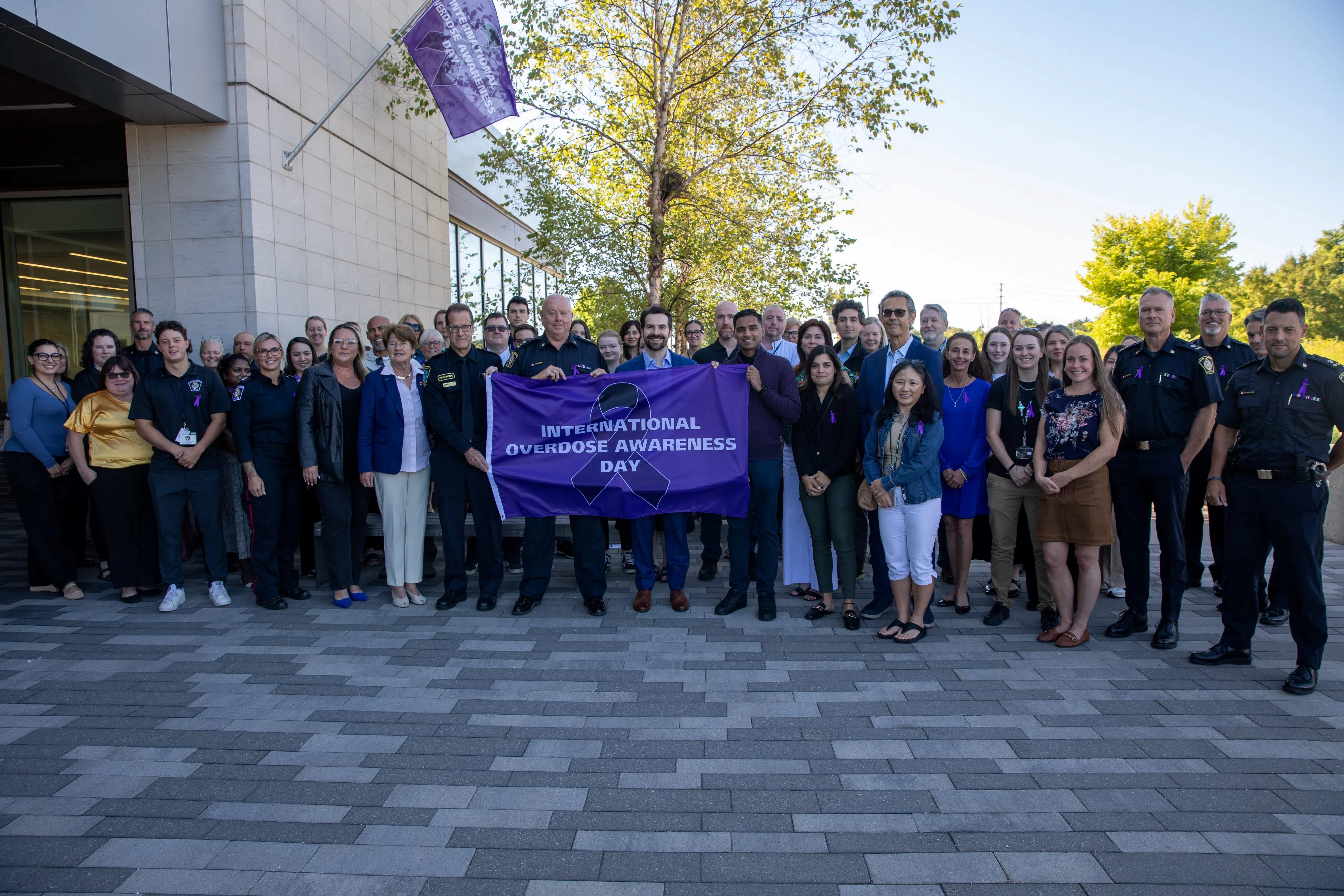Flag raising at Halton Police headquarters for International Overdose Awareness Day