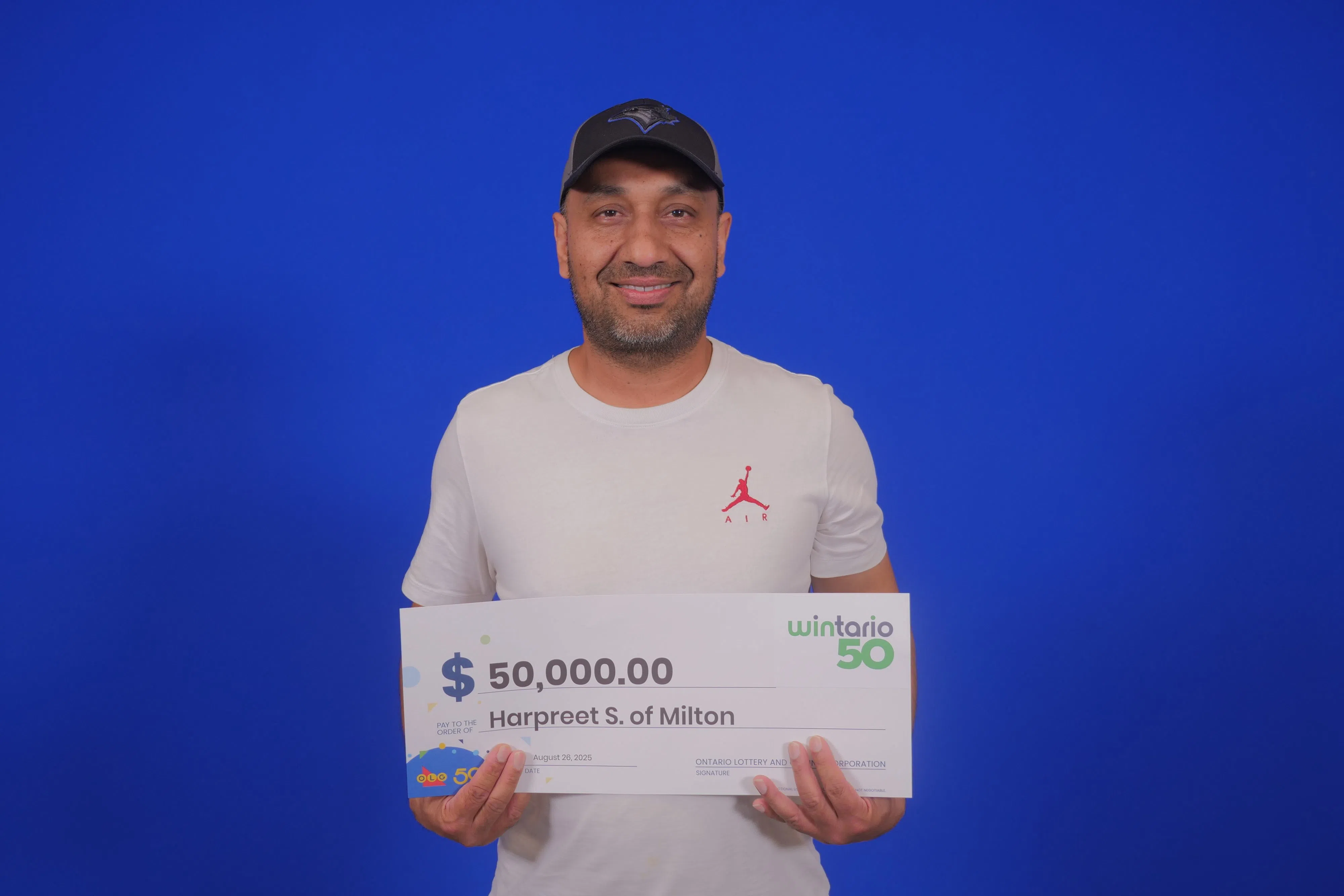 Milton man plans to use lottery winnings on his children's education