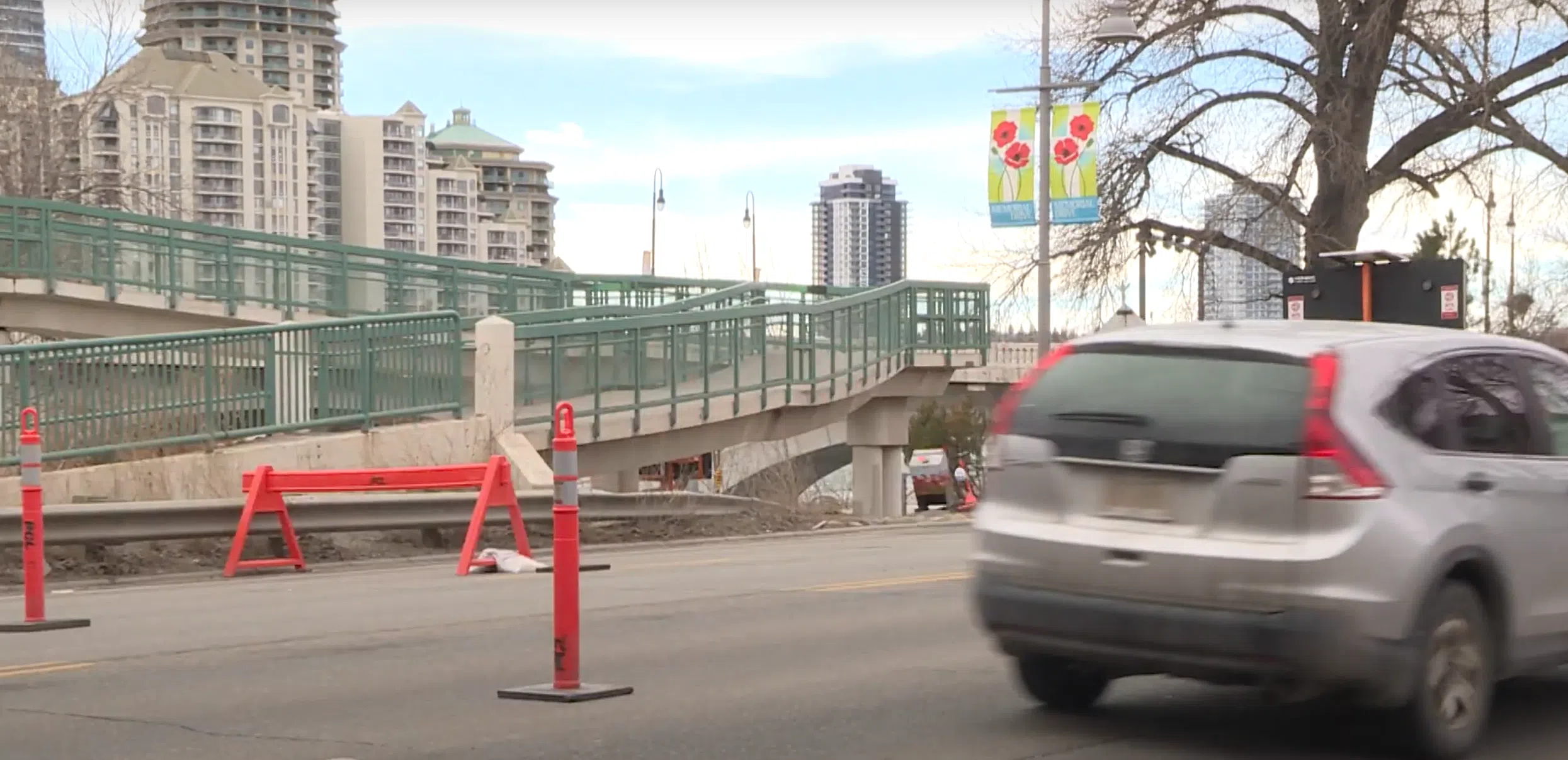 Flood barrier construction leads to road and path closures along Memorial Drive