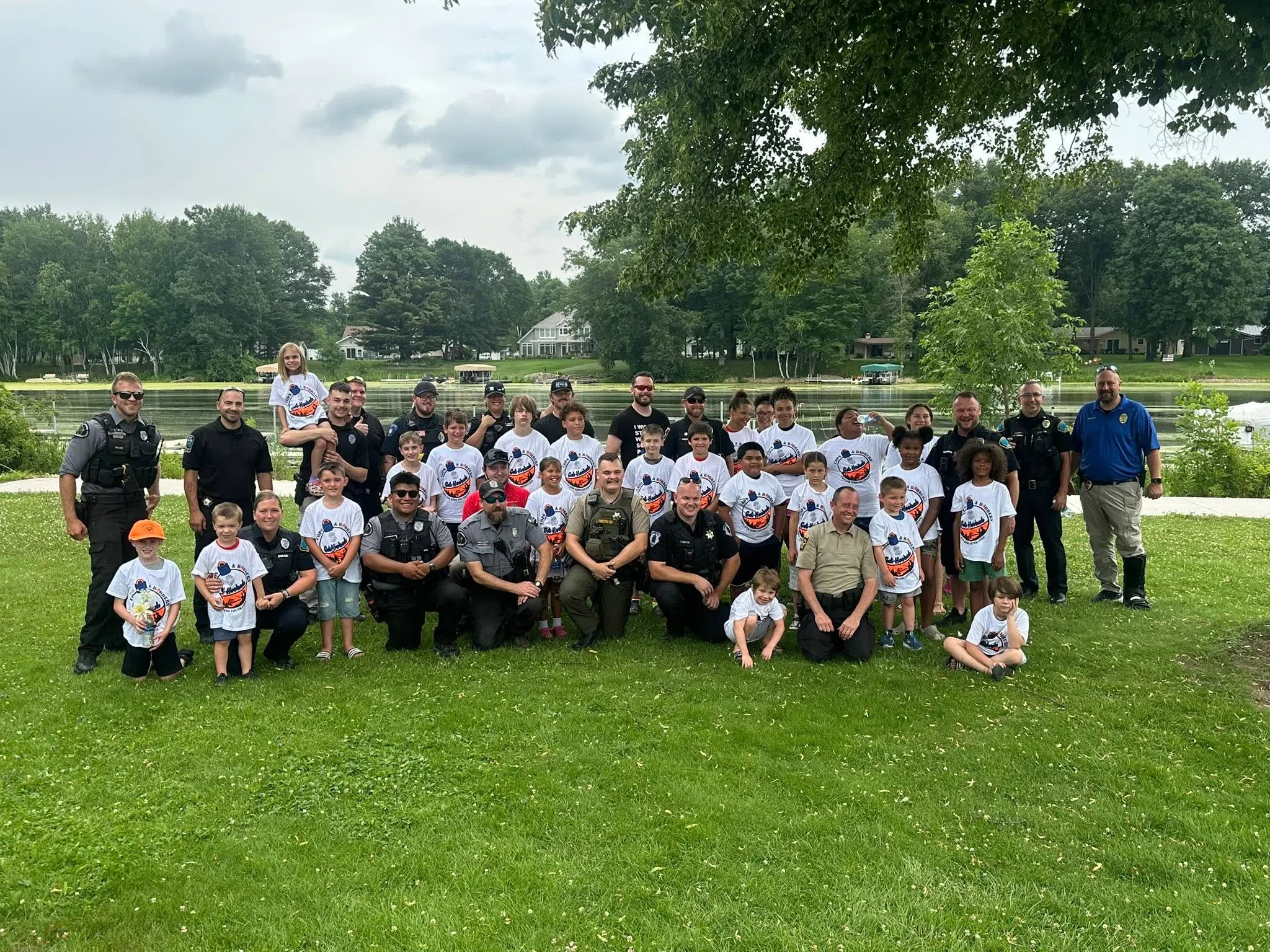 Shawano Officers Reel in Connections with Kids at Annual Fishing Event