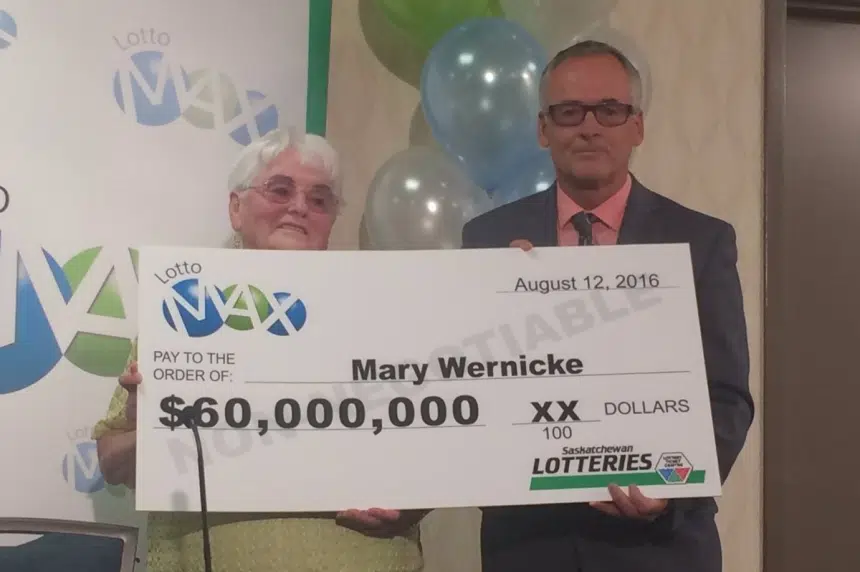 Saskatchewan's biggest lottery winner collects her prize