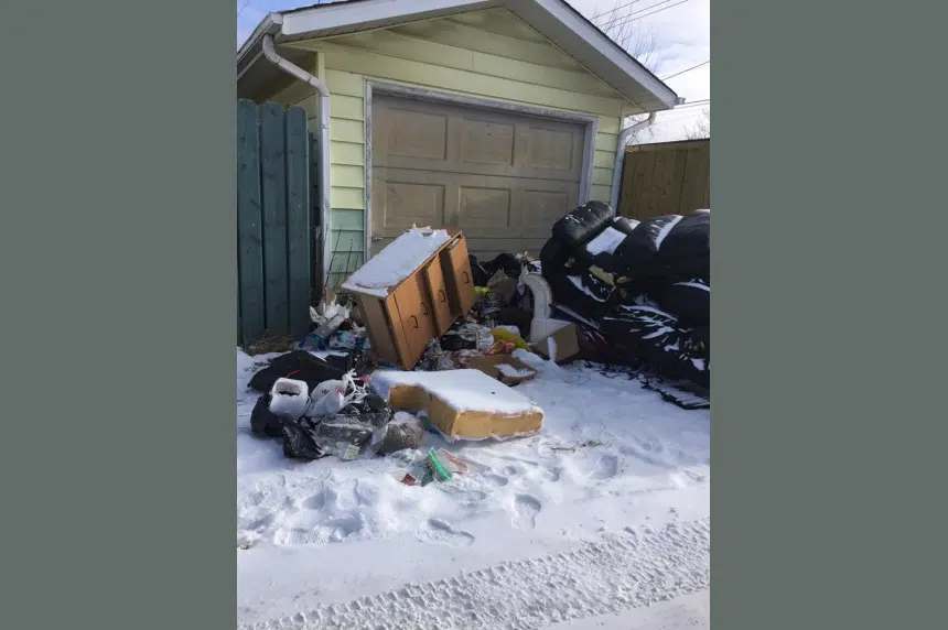 Saskatoon woman forced to pay after garbage illegally dumped in back alley