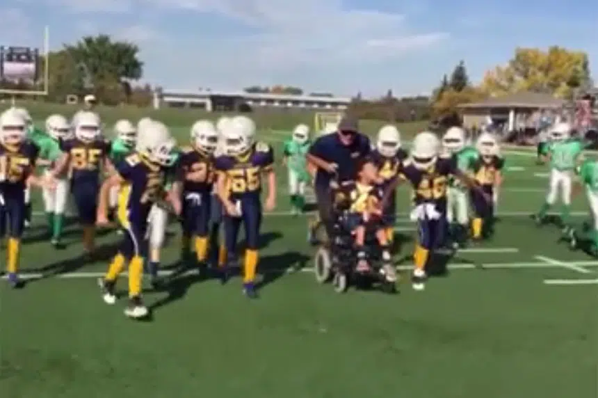 Regina boy gets touchdown in football game to remember