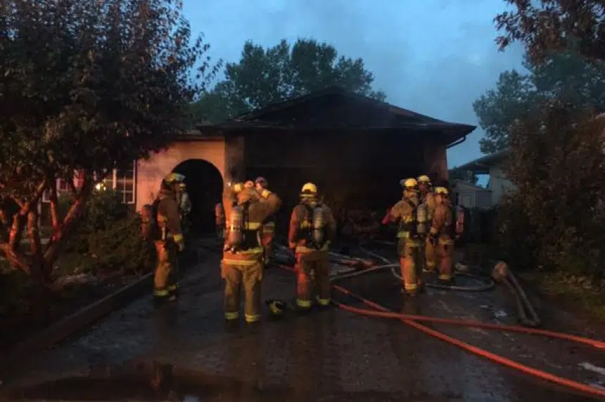 Garage fire wakes family in northwest Regina