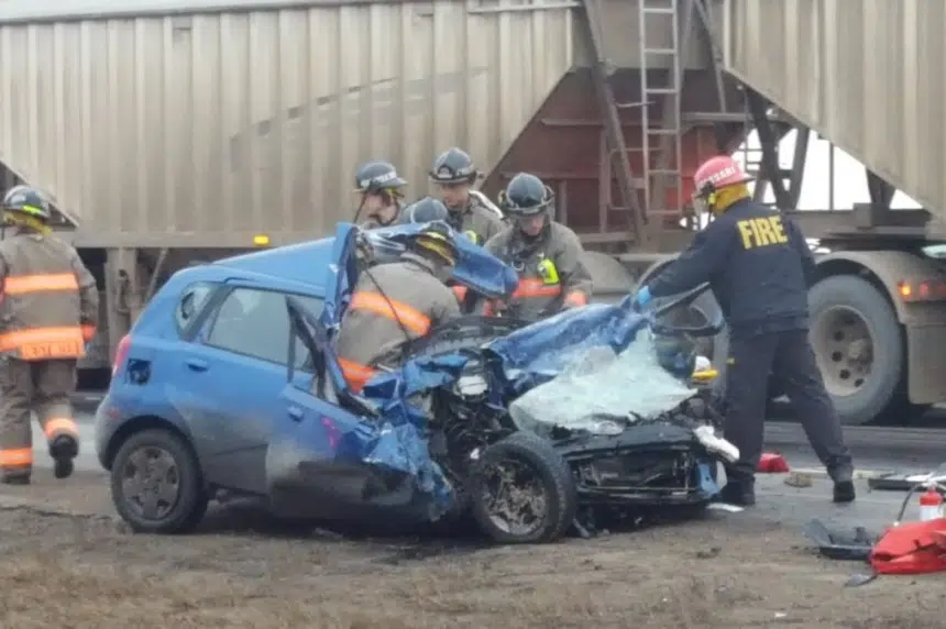 Person taken to hospital following head-on crash between car, semi in Saskatoon