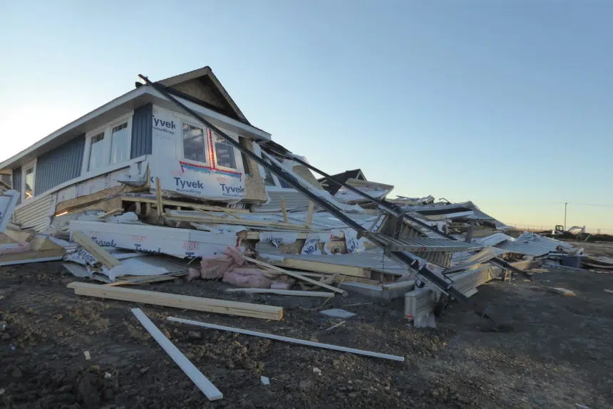 Townhome under construction crumbles in the wind
