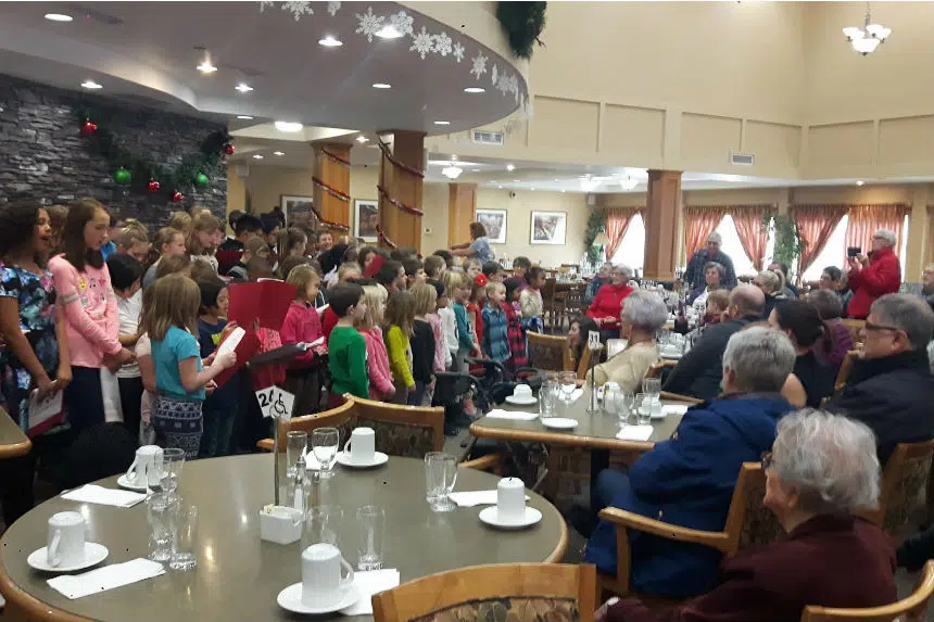 ‘The true spirit of Christmas:’ Regina students sing carols to seniors