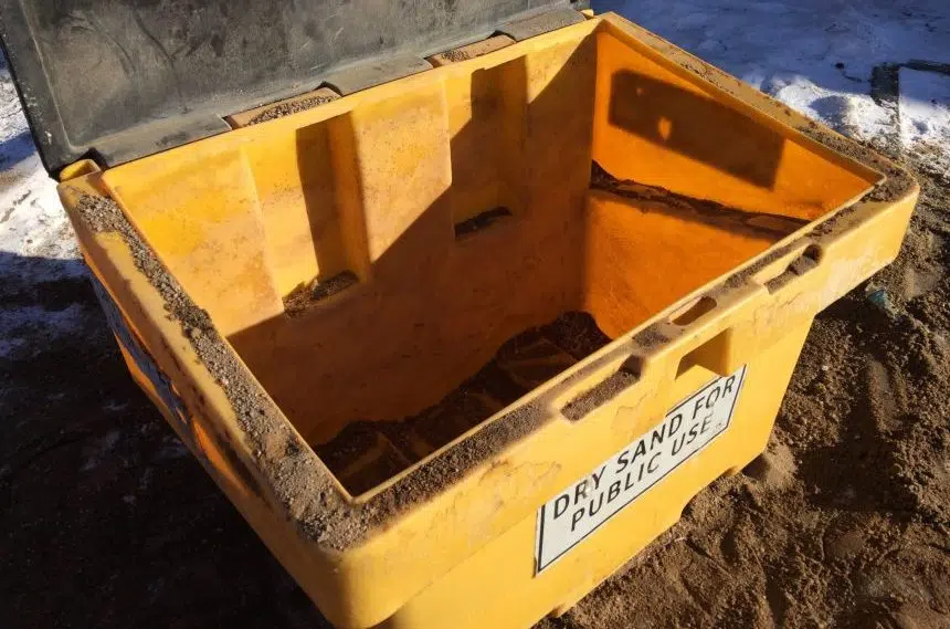 Bins of free sand for sidewalk ice control emptying quickly