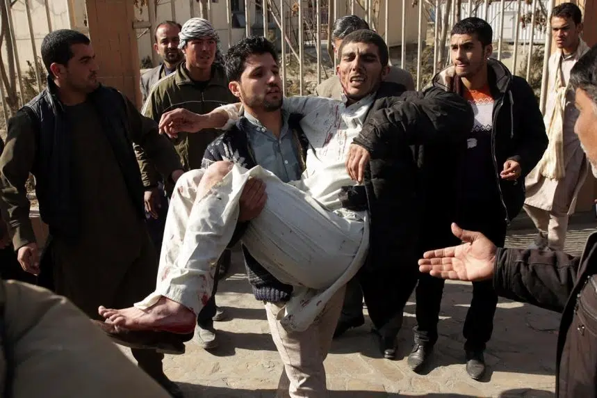 Bomber in ambulance detonates at Afghan checkpoint; 95 dead