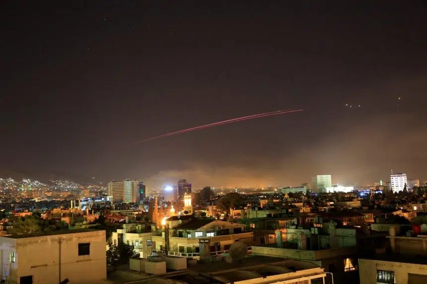 Explosions rock Syrian capital as Trump announces strikes