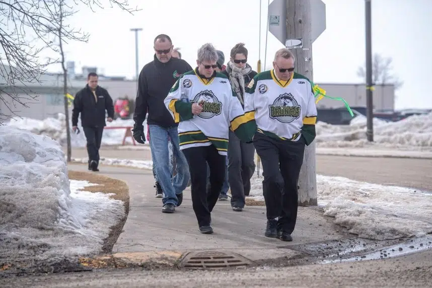 Broncos head coach remembered for actions on and off the ice