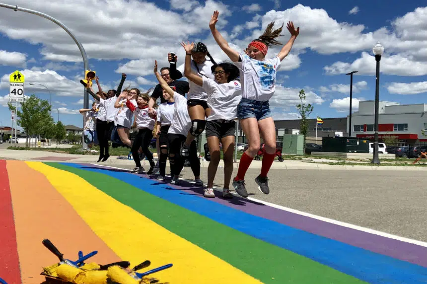 Elementary students paint Regina's first rainbow crosswalk