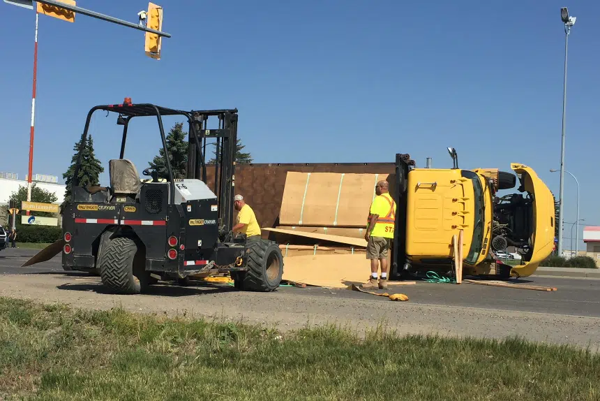 Tipped over lumber truck causes Regina traffic restriction