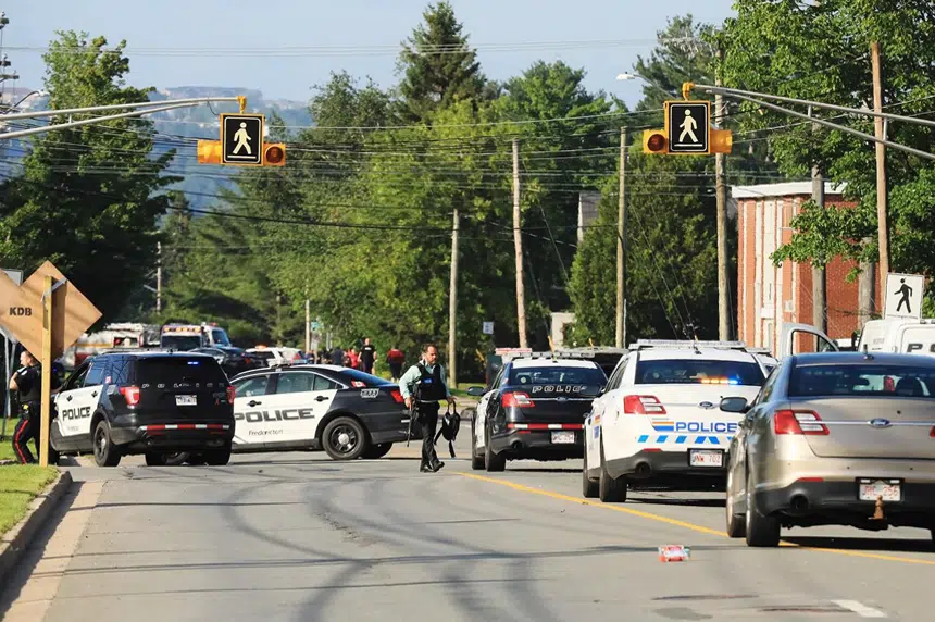 Two officers among four people dead in New Brunswick shooting