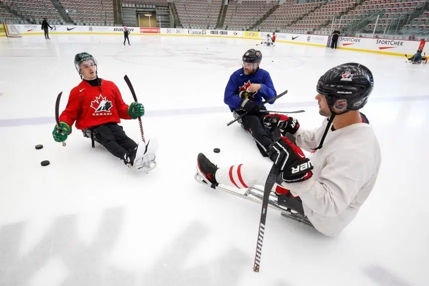 ‘I’ll get better’: Paralyzed Broncos player working to improve at sledge hockey