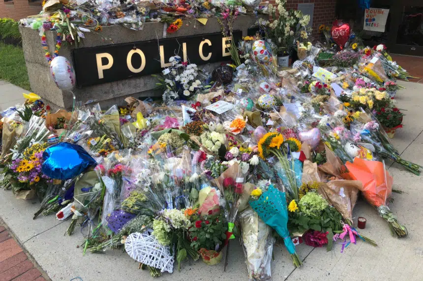 Fredericton police collect cards, flowers left at makeshift memorial