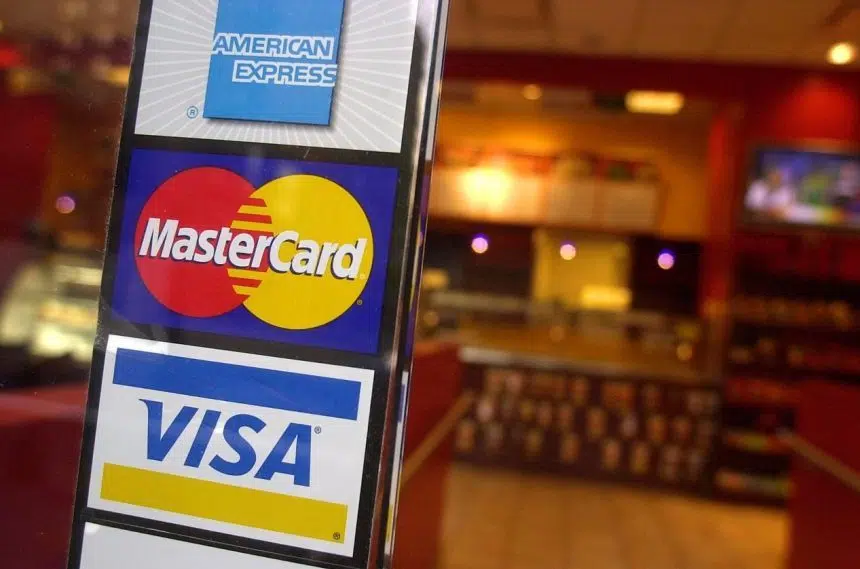Credit card firms to trim merchant fees, but some retailers ‘underwhelmed’