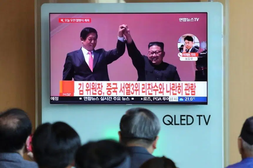 N. Korea stages huge parade, holds back on advanced missiles