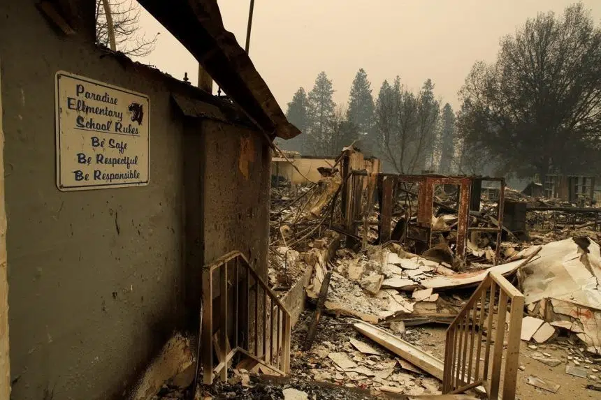 Wildfire death toll rises as search for missing continues