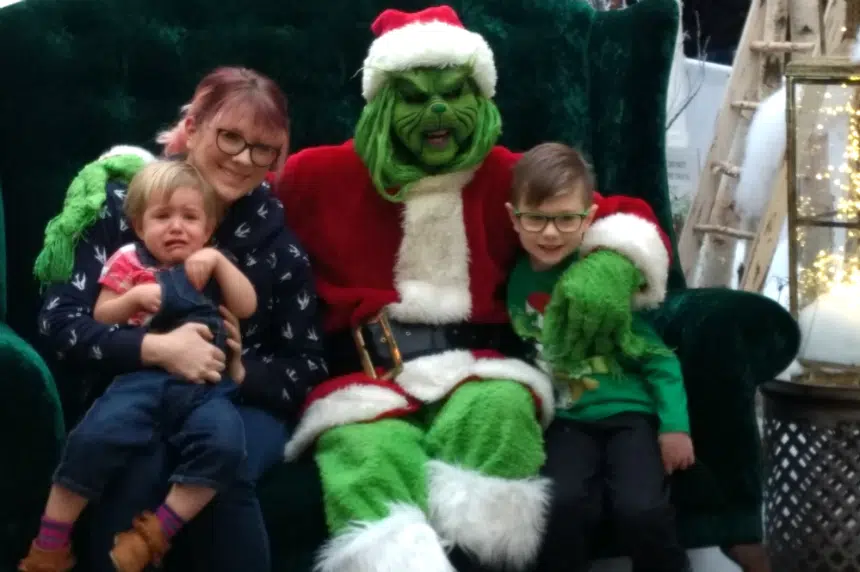 Popular photos with the Grinch spark some smiles and tears