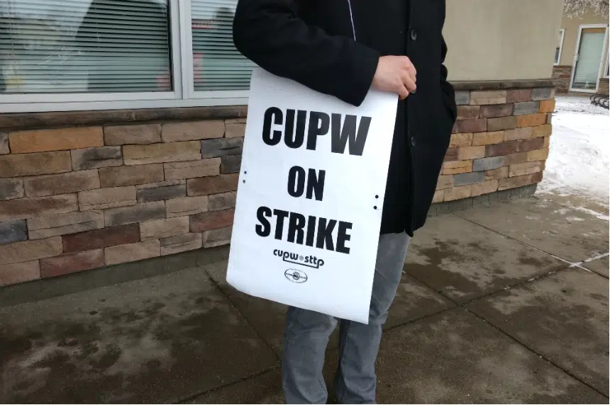 Postal workers protest back-to-work legislation in Regina