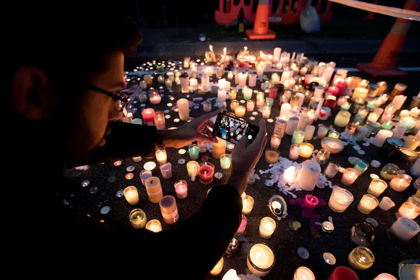 Defiant vigil starts healing in New Zealand after massacre