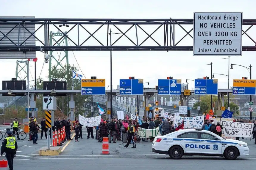 Climate protesters shut down bridges in Canadian cities as part of global action