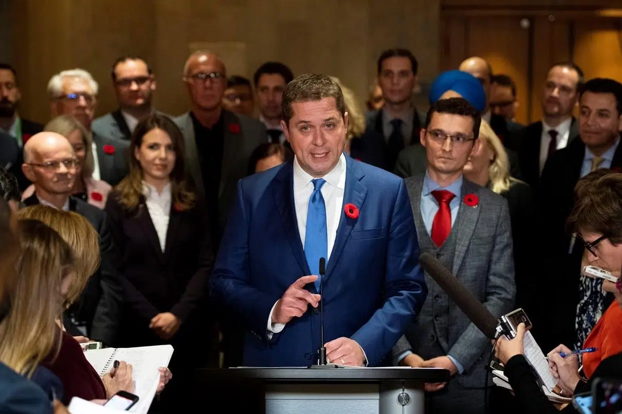 Scheer survives leadership review by MPs, but now must take his case on the road