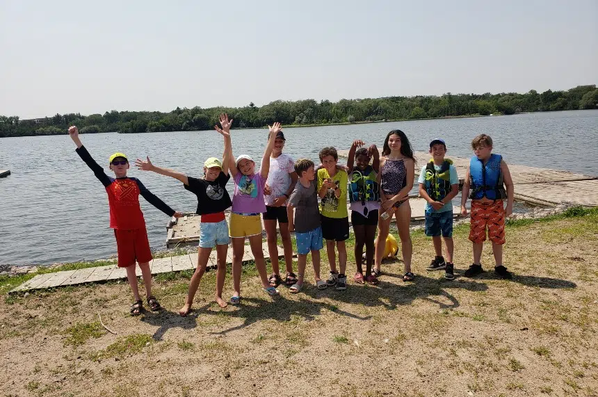 Kids take advantage of summertime heat, end of COVID rules