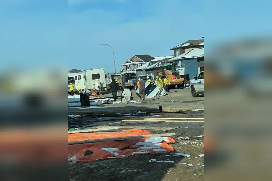 Driver charged after vehicle goes into excavation in northwest Regina