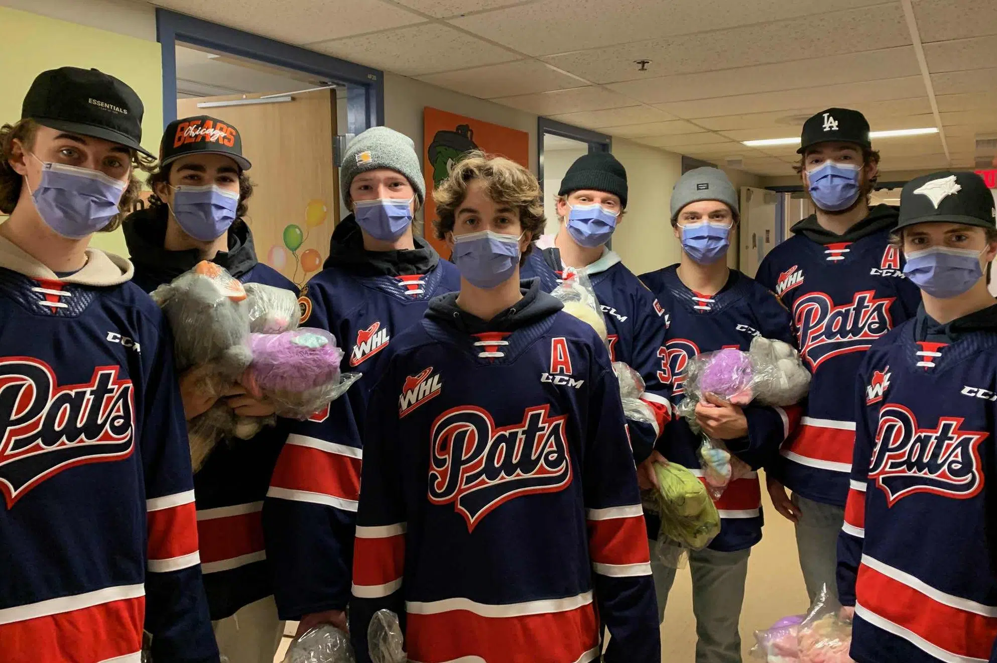 Pats hand out teddy bears to kids at Regina General Hospital