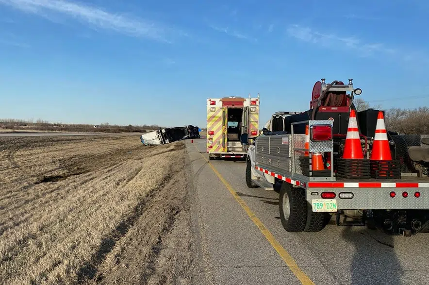Tipped semi trailer delays traffic on Highway 1