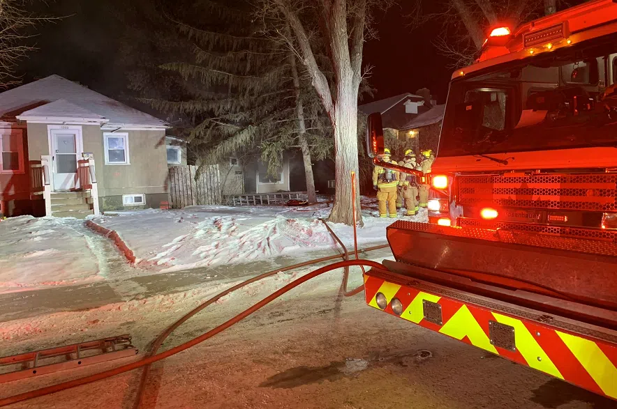 Two people escape overnight house fire in North Central without injury