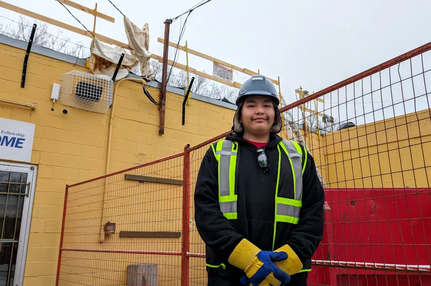 Local student gives back with roof repair to Regina non-profit