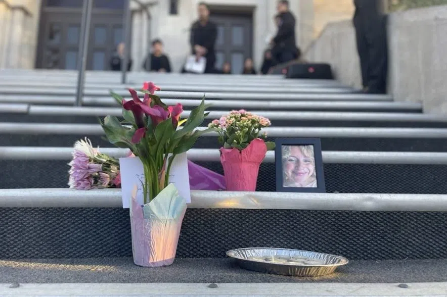 A small display remembering the victims sat at the bottom of the steps at the church.