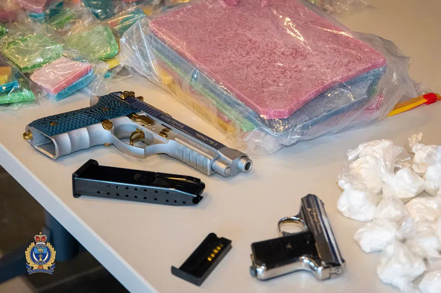 The products of a drug and weapons seizure in Regina.