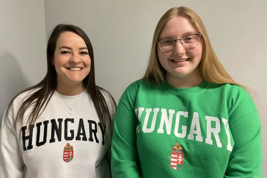 Meghan Jerkovits and Zypora Petrowsky are ambassadors with the Hungarian pavilion. (Gillian Massie/ 980 CJME)