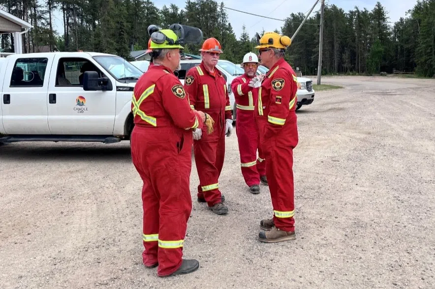 Wildfire teams aer working side-by-side with the Candle Lake Fire Department to FireSmart properties—clearing brush, trimming branches, and reducing fuel loads. (Resort Village of Candle Lake/Facebook)
