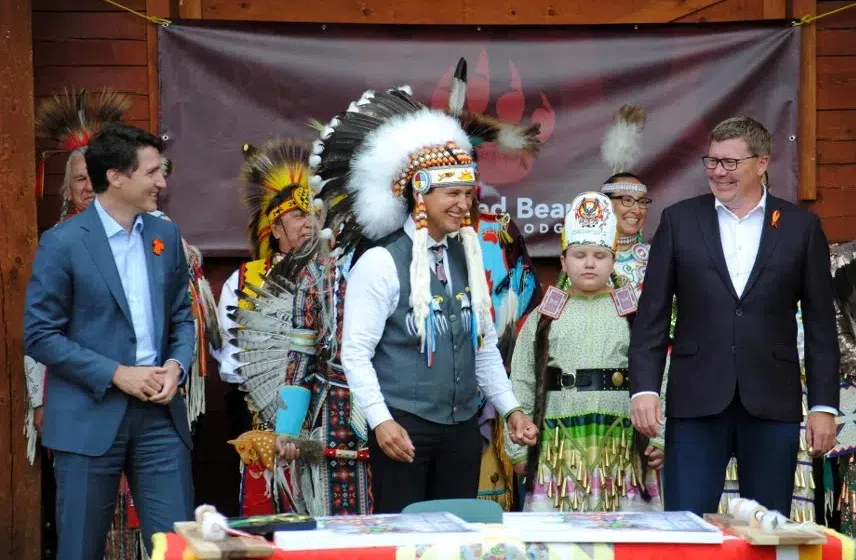 Former Prime Minister Justin Trudeau, Cadmus Delorme, and Premier Scott Moe in July of 2021. Delorme was elected Chief of Cowessess First Nation in 2016 and served in that role until 2023 (980 CJME file photo).