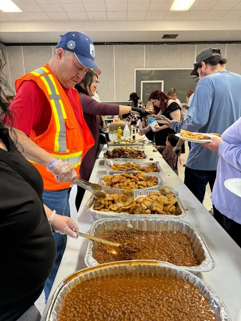 Volunteers filled up the plates of evacuees who were happy to recieve a home cooked meal. (Tommy Bird/submitted)