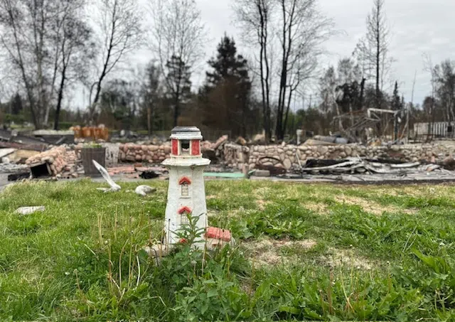 The lighthouse that Rhonda Werbicki received as a wedding gift 25 years ago once stood in front of her home. While everything burned around it, the lighthouse managed to survive the blaze (Rhonda Werbicki/submitted)