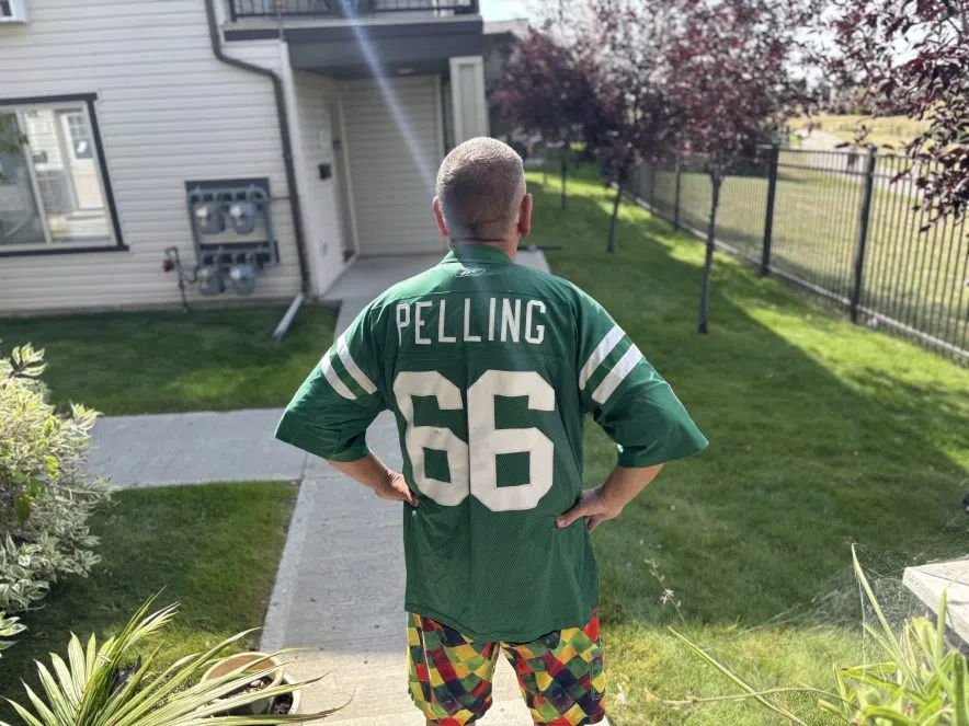 Drew Pelling wearing vintage Saskatchewan Roughriders jersey number 66, honouring his father Bob Pelling’s legacy.