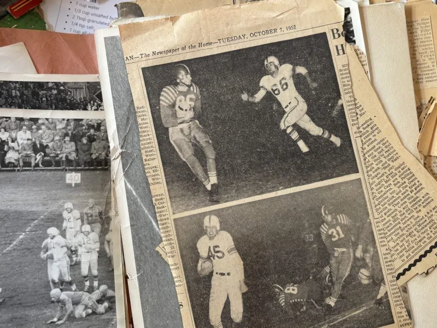 Bob Pelling in Saskatchewan Roughriders action photo from 1952, wearing number 66.