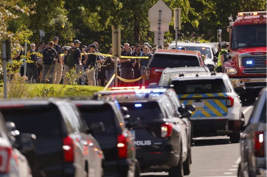law enforcement outside Annunciation Church's school shooting